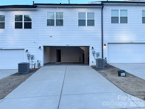 a house view with a outdoor space