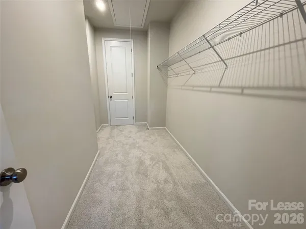 a view of a room with rack on the wall