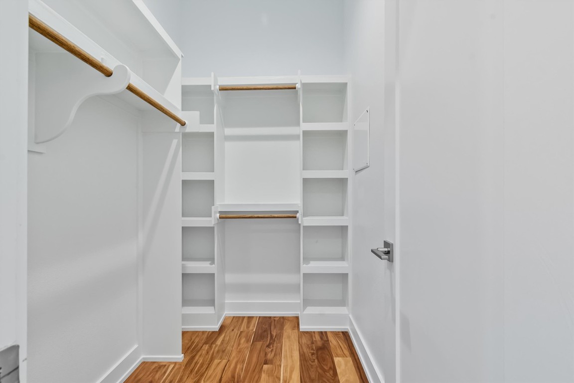 2712 Oak Springs Drive, Unit A Austin, TX 78702 - Photo 20 of 34 a view of walk in closet with empty racks