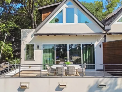 a house with a potted plant in front of it