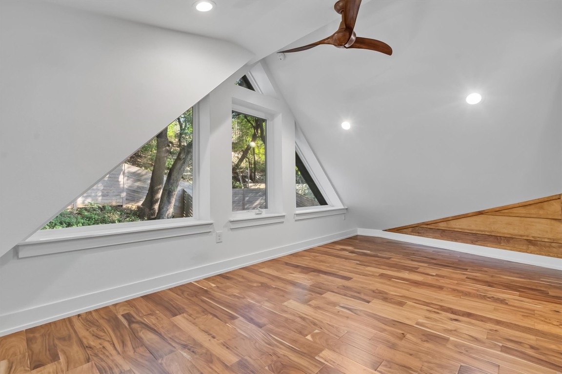 2712 Oak Springs Drive, Unit A Austin, TX 78702 - Photo 26 of 34 wooden floor in an empty room with a window