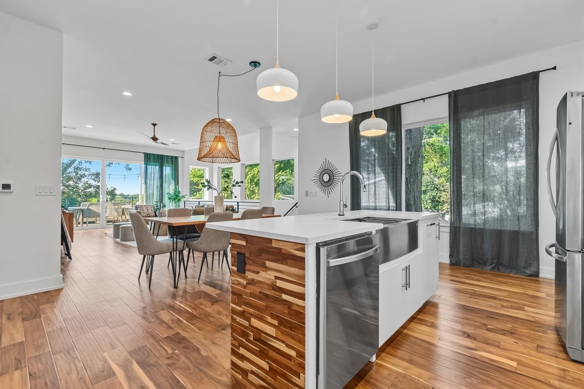 2712 Oak Springs Drive, Unit A Austin, TX 78702 - Photo 8 of 34 a view of a kitchen with a table and chairs