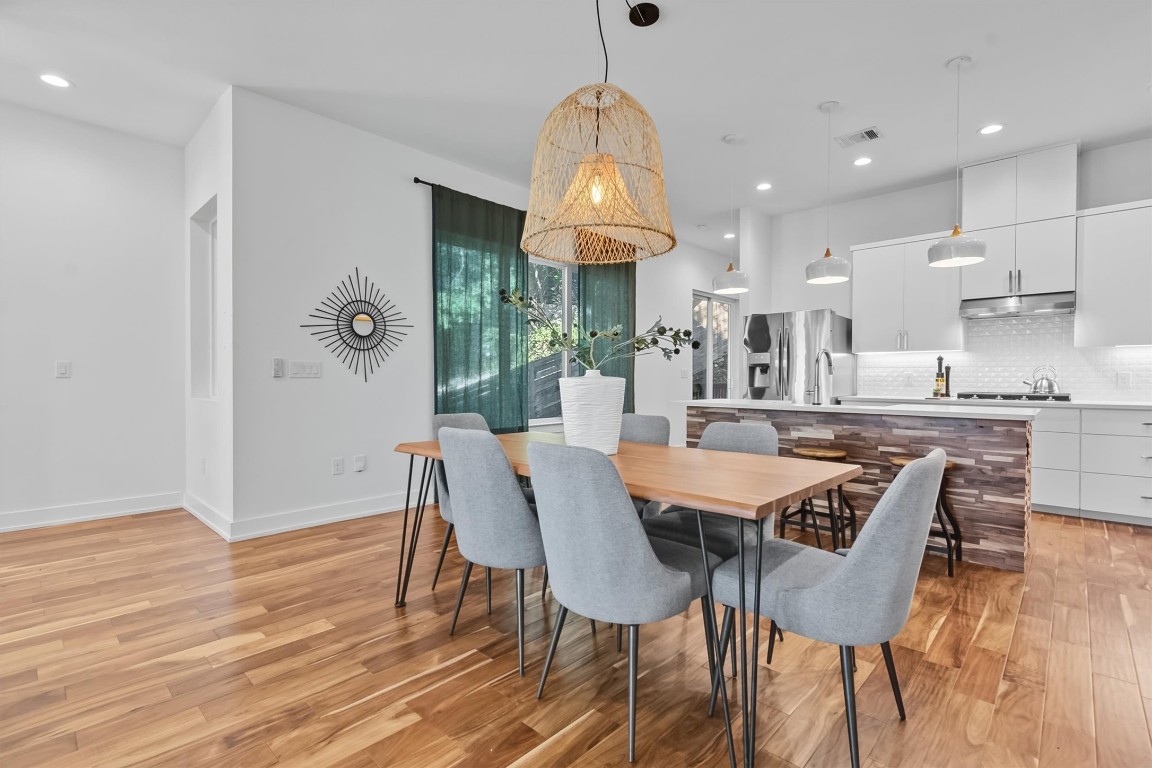 2712 Oak Springs Drive, Unit A Austin, TX 78702 - Photo 10 of 34 The open layout creates a seamless experience for serving meals.