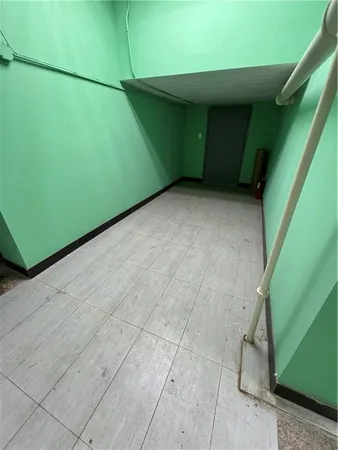 a view of living room with furniture and wall painting