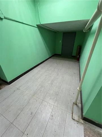 a view of living room with furniture and wall painting