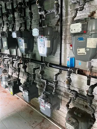 a living room with lots of furniture and a chandelier