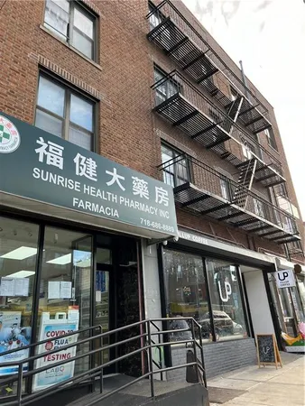 a view of a building with retail shop