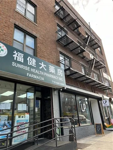 a view of a building with retail shop