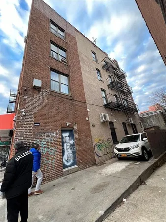 a car parked in front of a building
