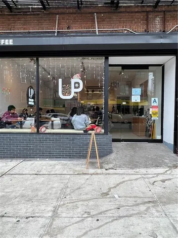 a view of street with sitting area