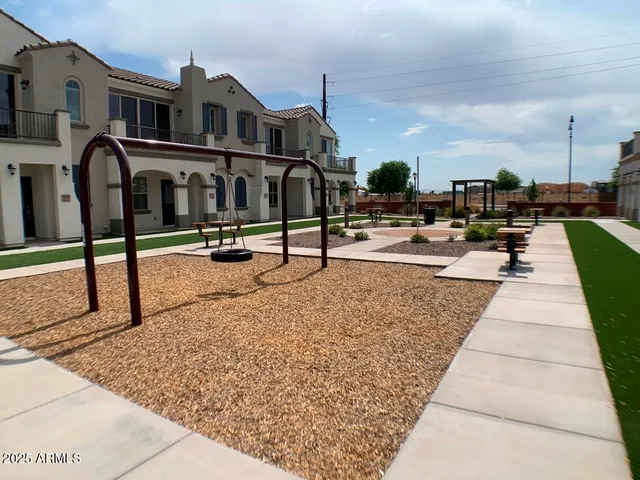a view of a swimming pool with a deck