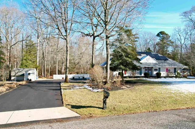 a view of a fountain is middle in the tall building