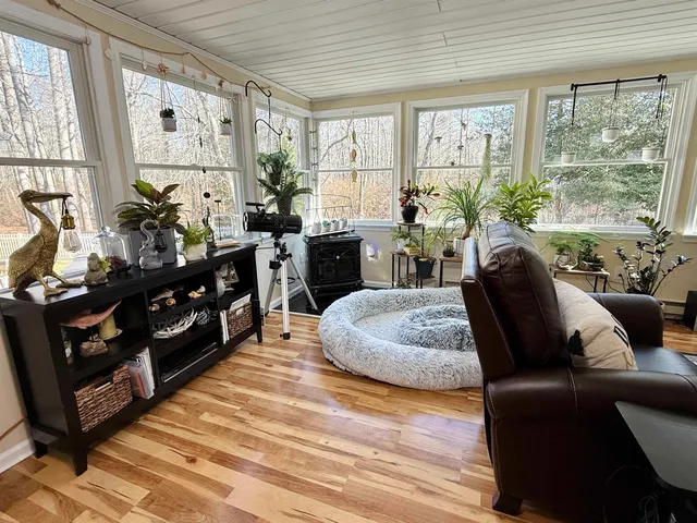 a bed room with a bed and a couch