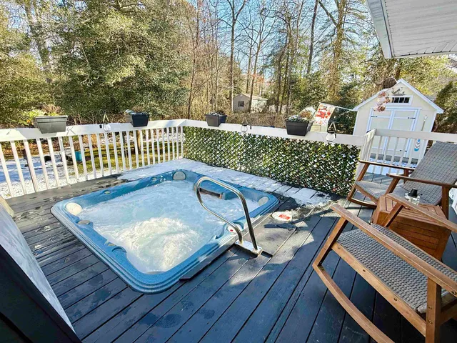 a utility house with a tree in the background