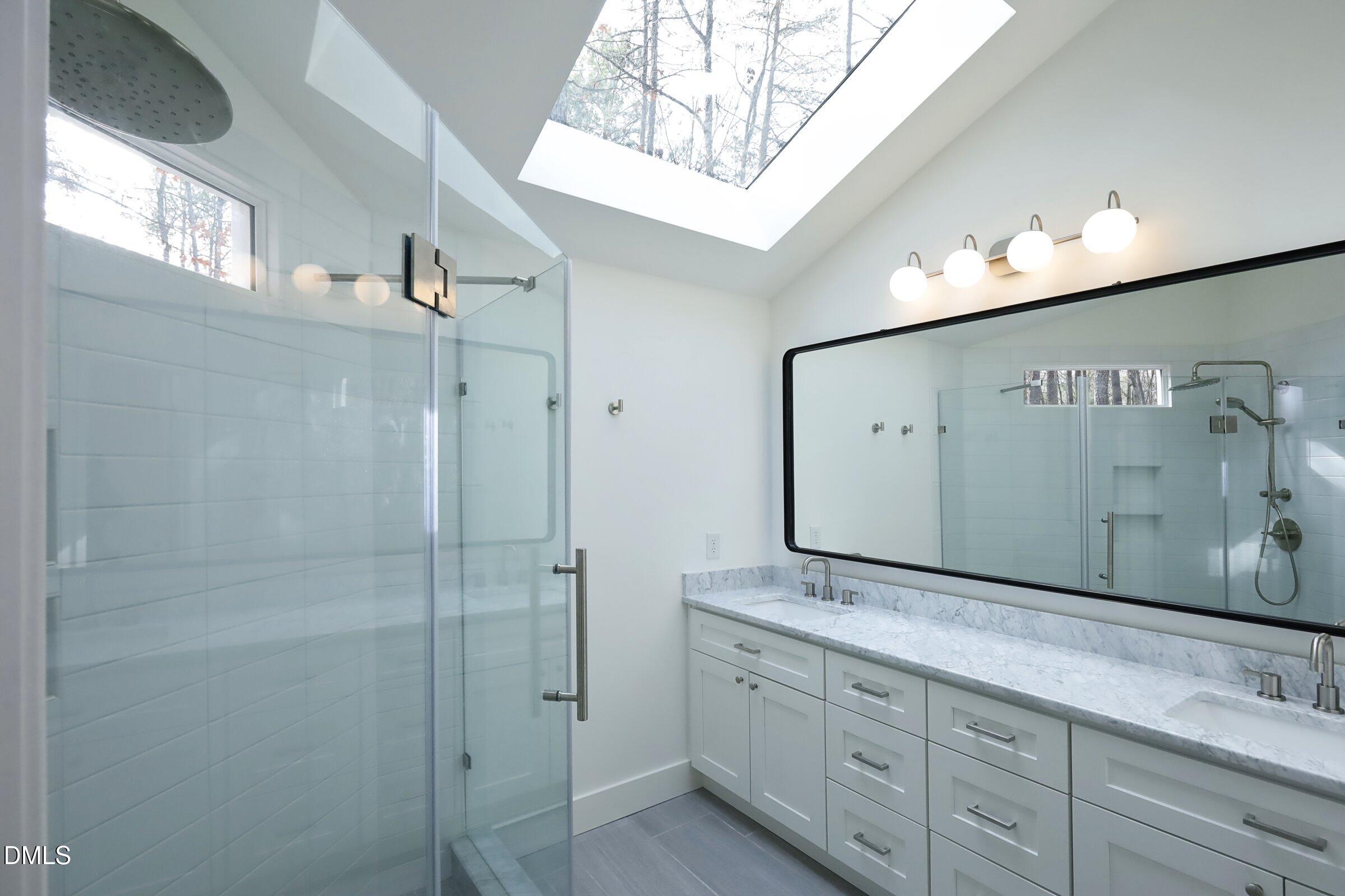 237 Glen Eden Road Durham, NC 27713 - Photo 20 of 37 a bathroom with a granite countertop sink mirror and double