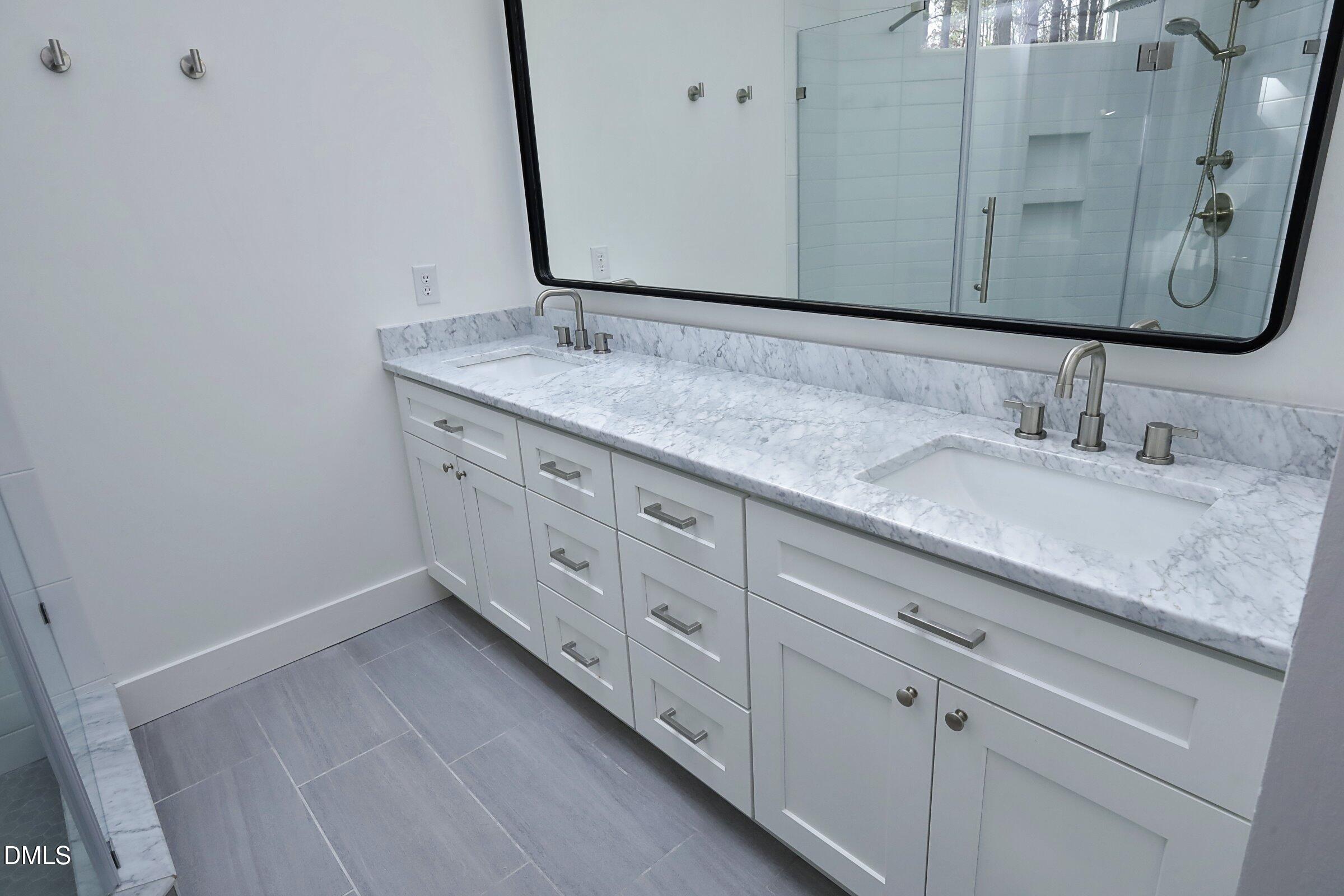 237 Glen Eden Road Durham, NC 27713 - Photo 21 of 37 a bathroom with a granite countertop sink and a mirror