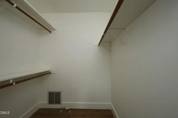 a view of small space with racks on the wall