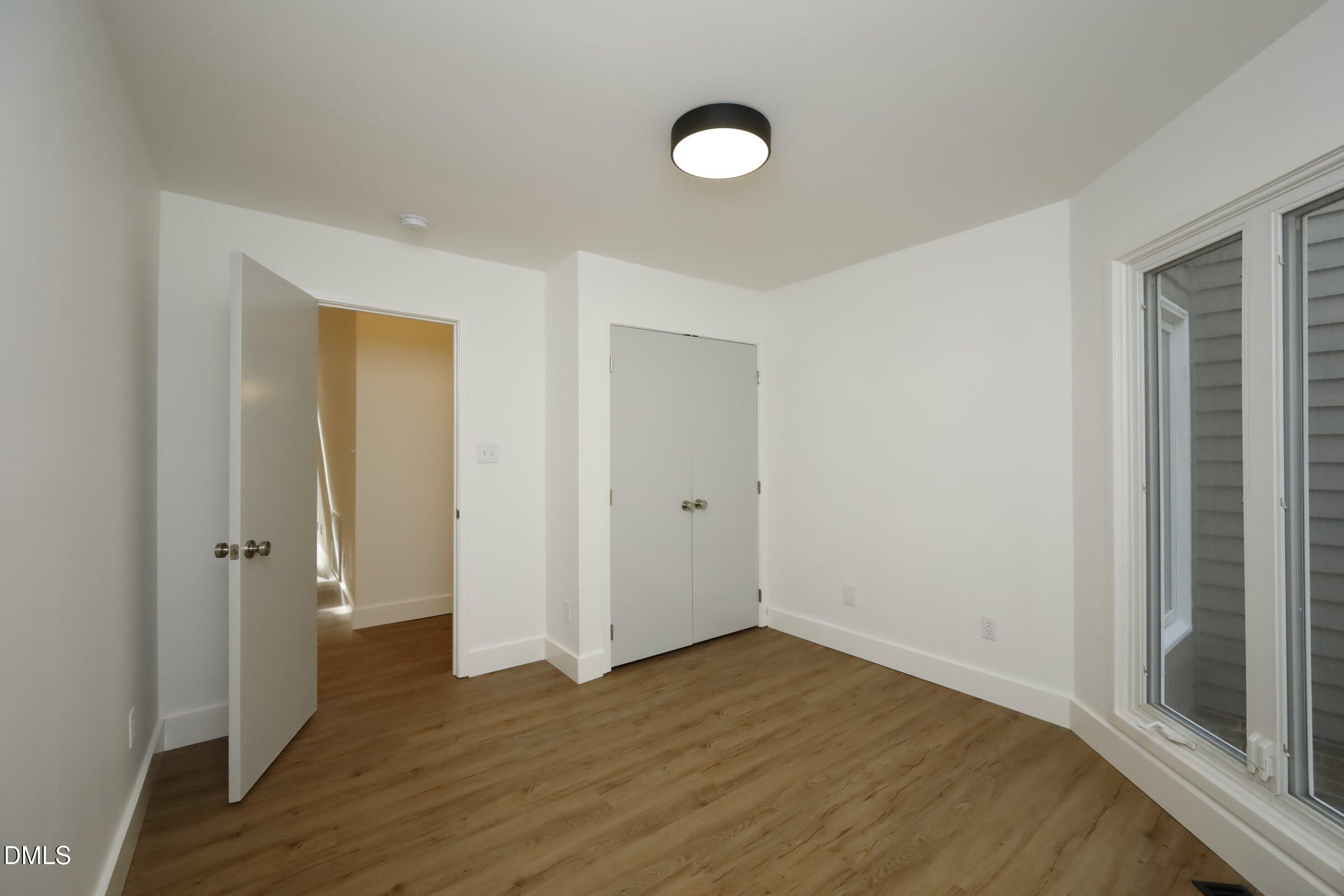 237 Glen Eden Road Durham, NC 27713 - Photo 28 of 37 a view of a room with wooden floor