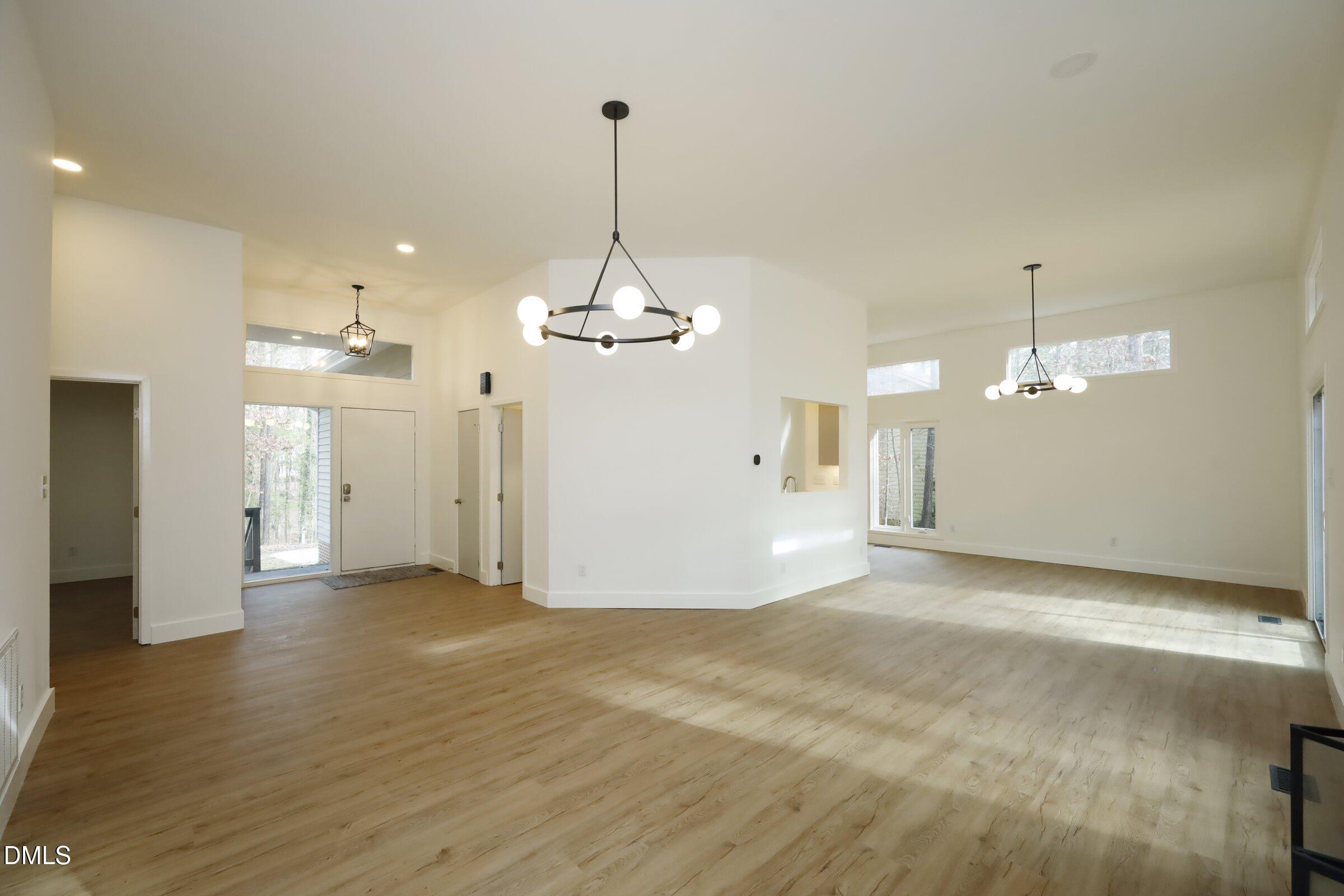 237 Glen Eden Road Durham, NC 27713 - Photo 7 of 37 a view of a kitchen with a sink and a chandelier