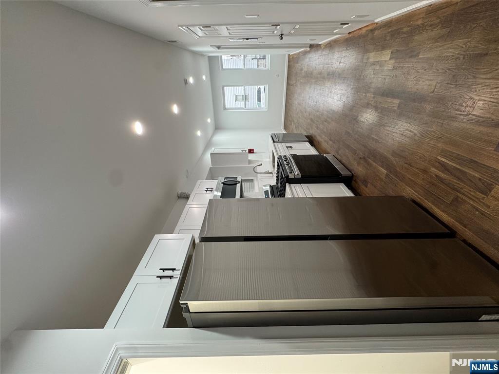 a view of a refrigerator in kitchen and a refrigerator