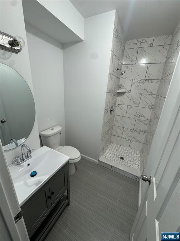 196 Malvern Street, Unit 1 Newark, NJ 07105 - Photo 10 of 16 a bathroom with a sink toilet and shower