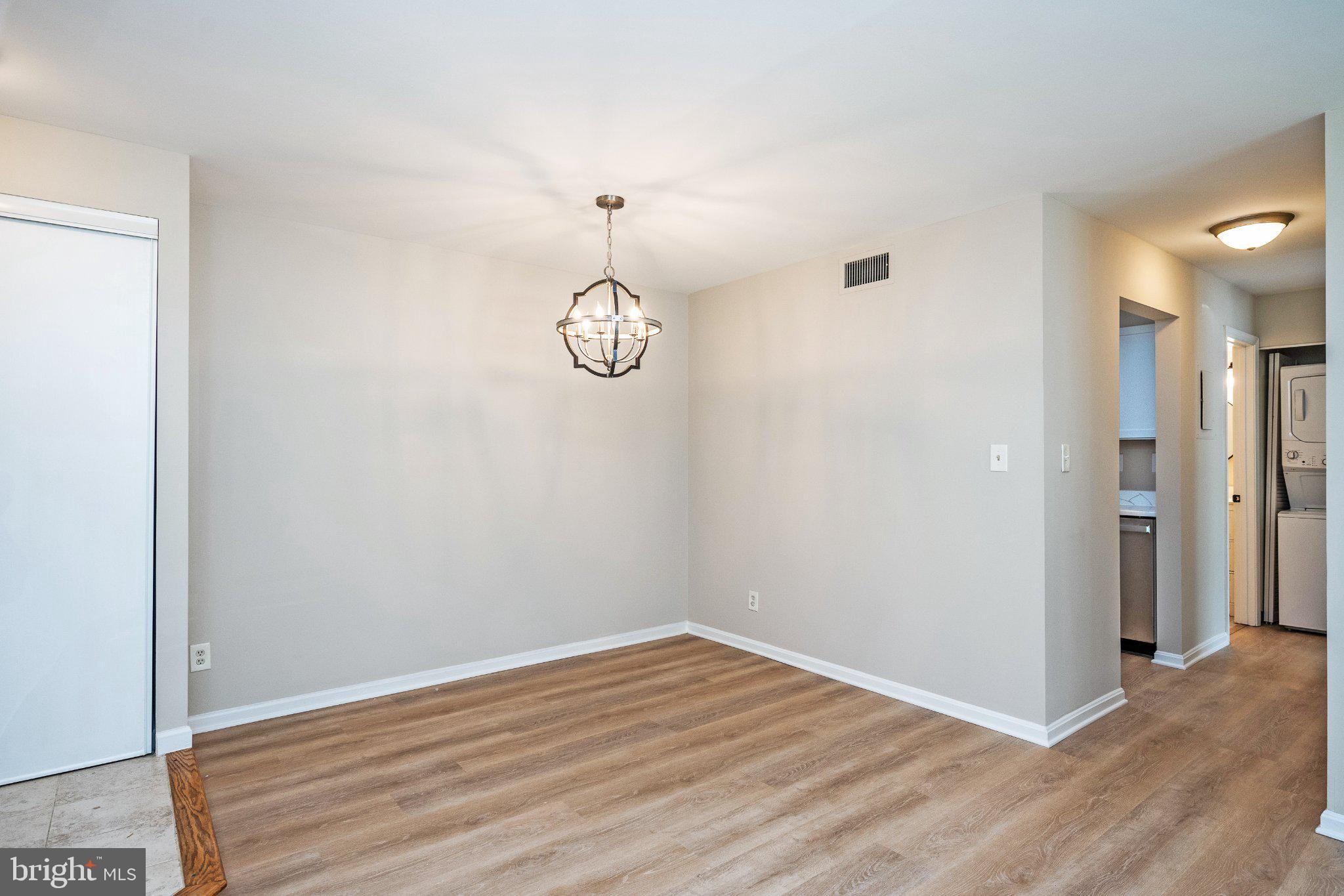 5908 Cove Landing Road, Unit 204 Burke, VA 22015 - Photo 6 of 32 Dining area and hallway