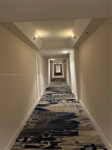 a room with furniture and a mirror