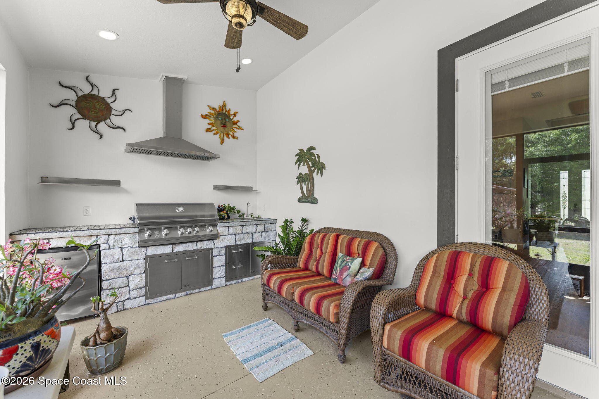 1740 Ford Road Mims, FL 32754 - Photo 35 of 43 a bedroom with furniture and a chandelier