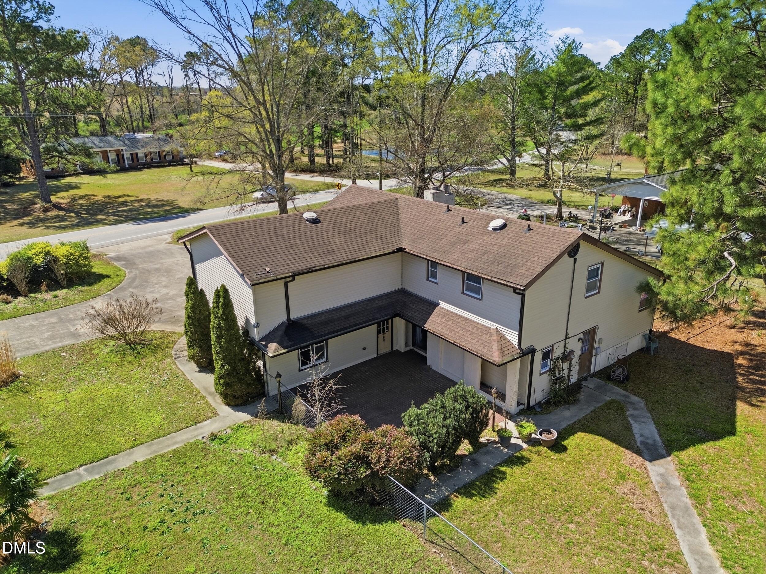 19405 Highway 210 Angier, NC 27501 - Photo 17 of 49 a view of a house with a yard outdoor and sitting area