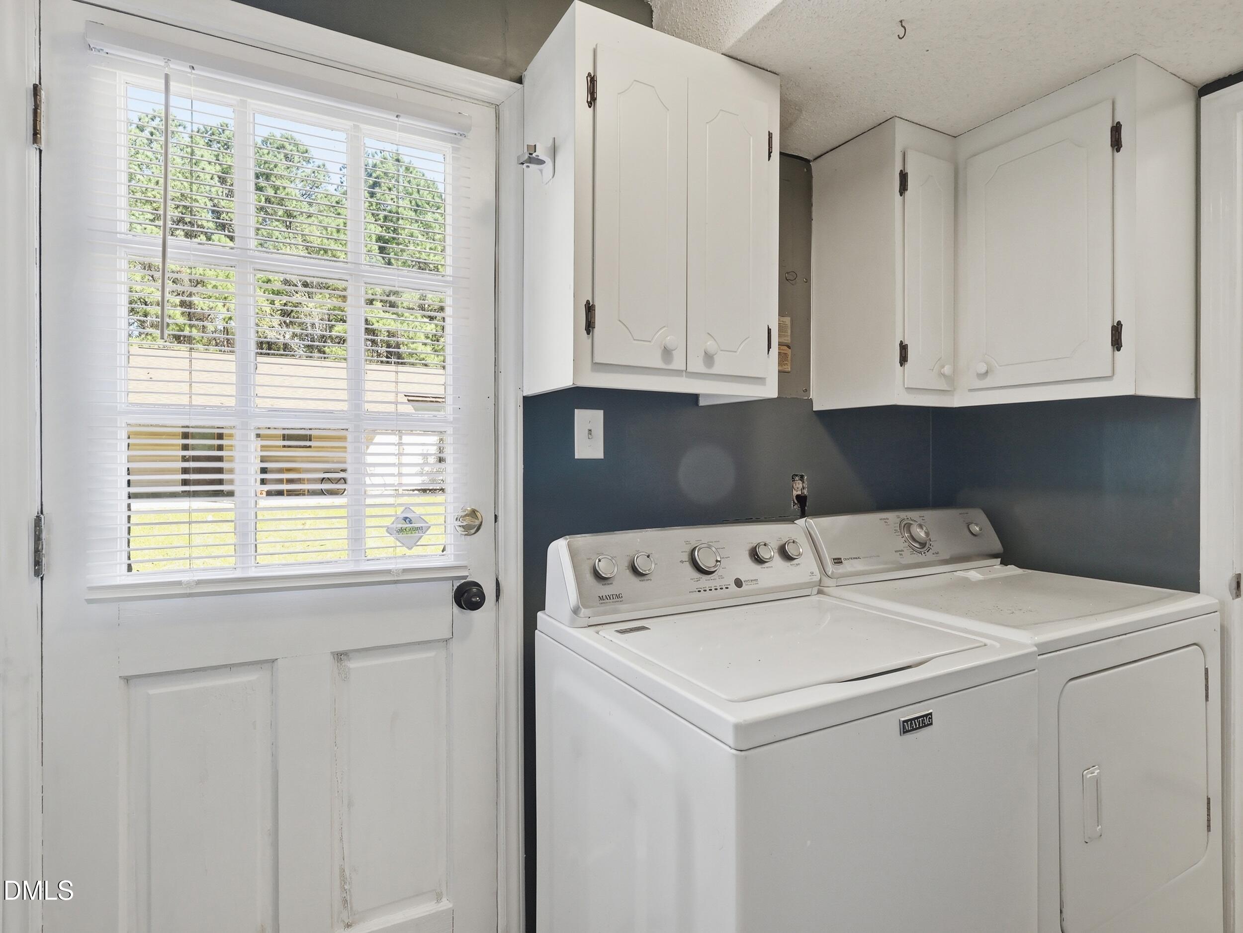 19405 Highway 210 Angier, NC 27501 - Photo 18 of 49 a utility room with dryer and washer