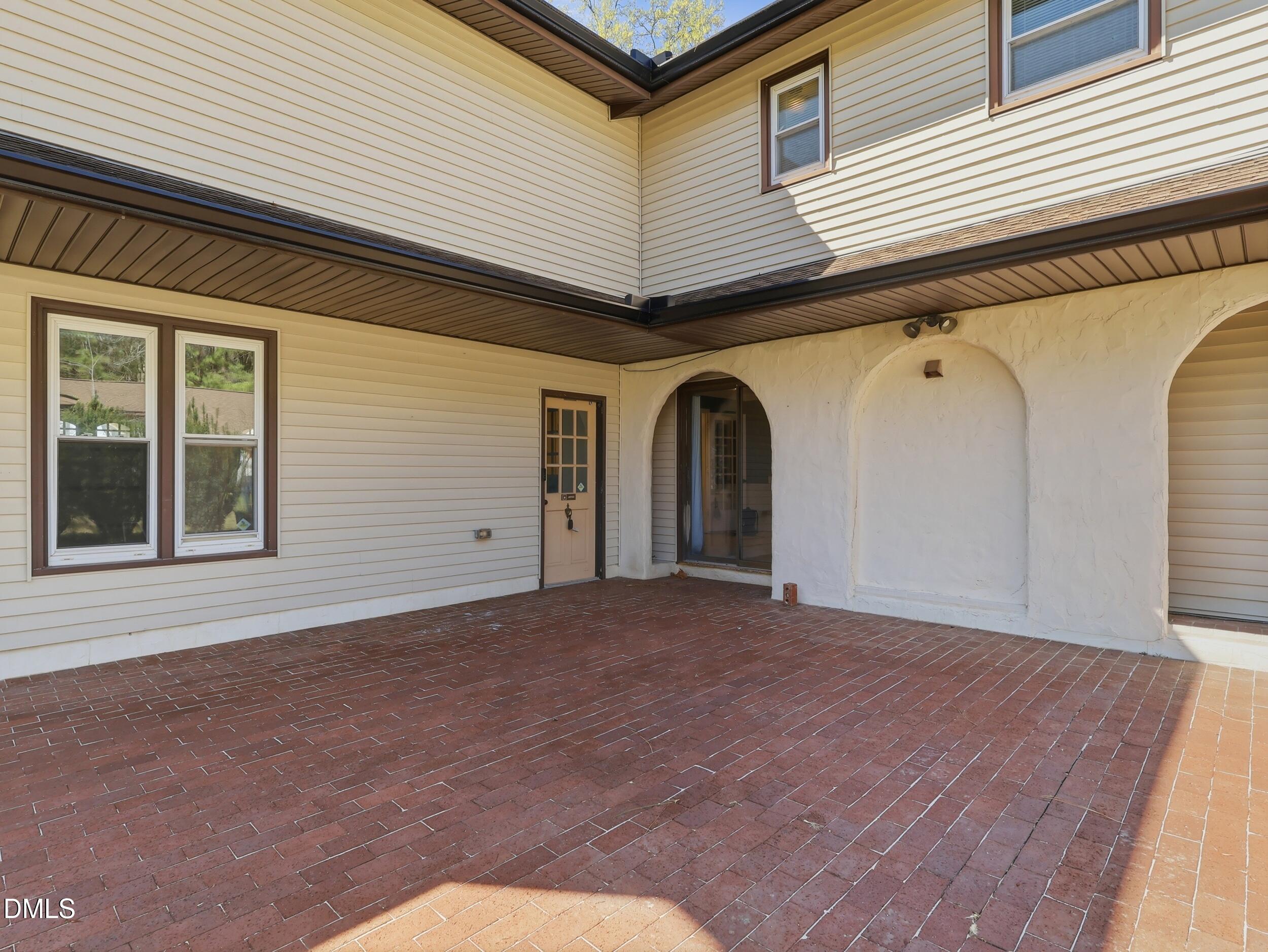 19405 Highway 210 Angier, NC 27501 - Photo 2 of 49 a view of a house with a wooden deck