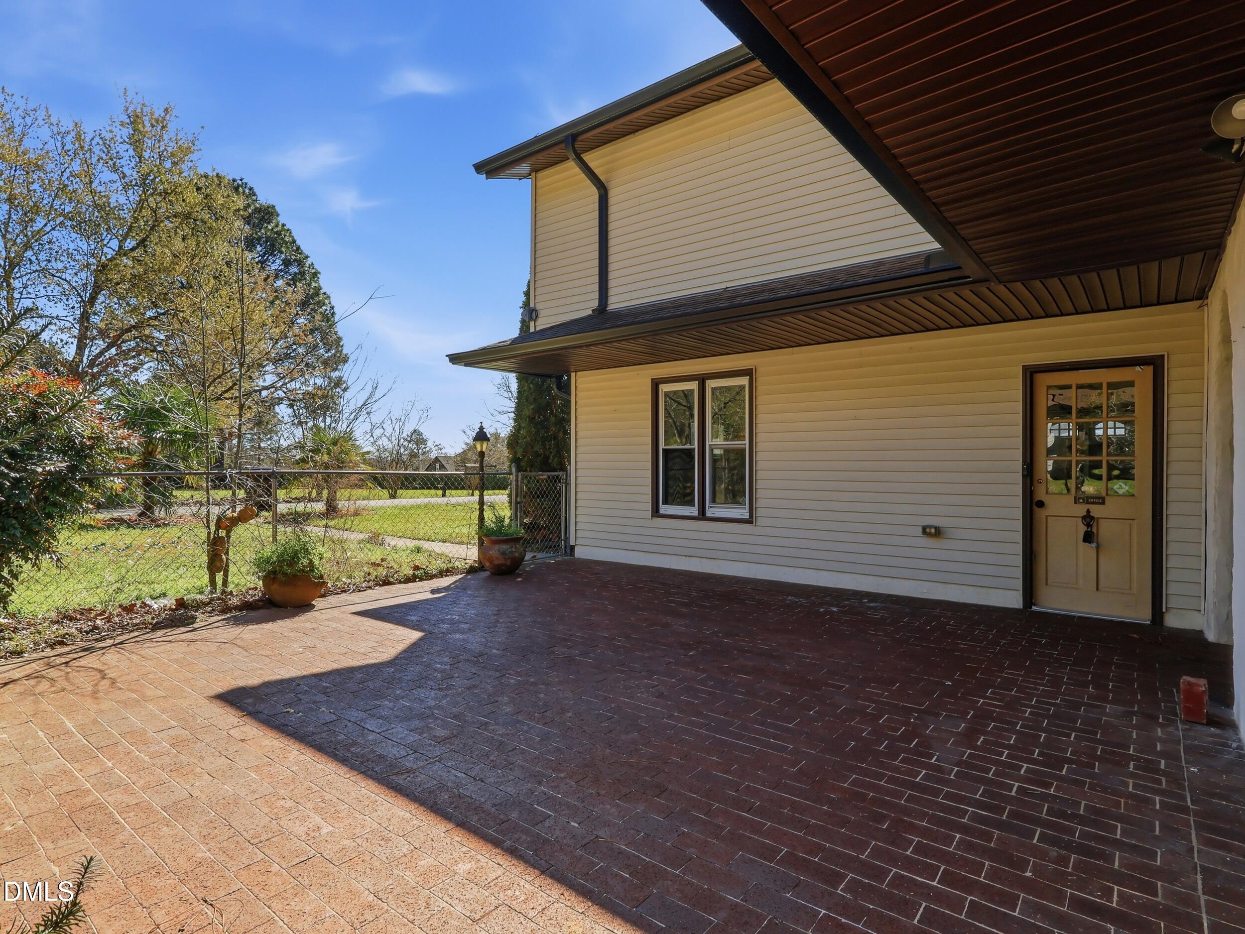 19405 Highway 210 Angier, NC 27501 - Photo 34 of 49 a view of a house with backyard and trees