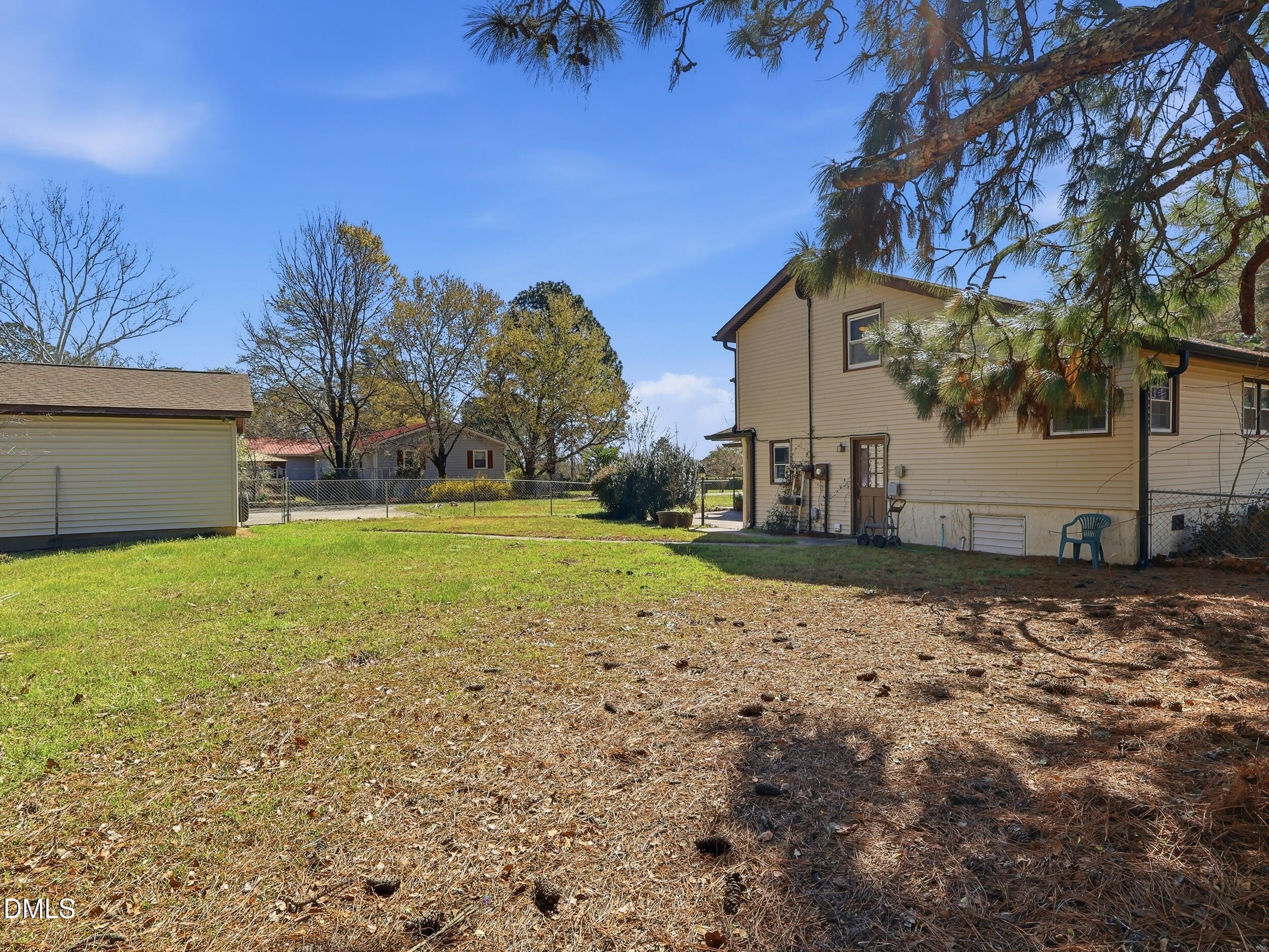 19405 Highway 210 Angier, NC 27501 - Photo 37 of 49 a view of a house with a yard