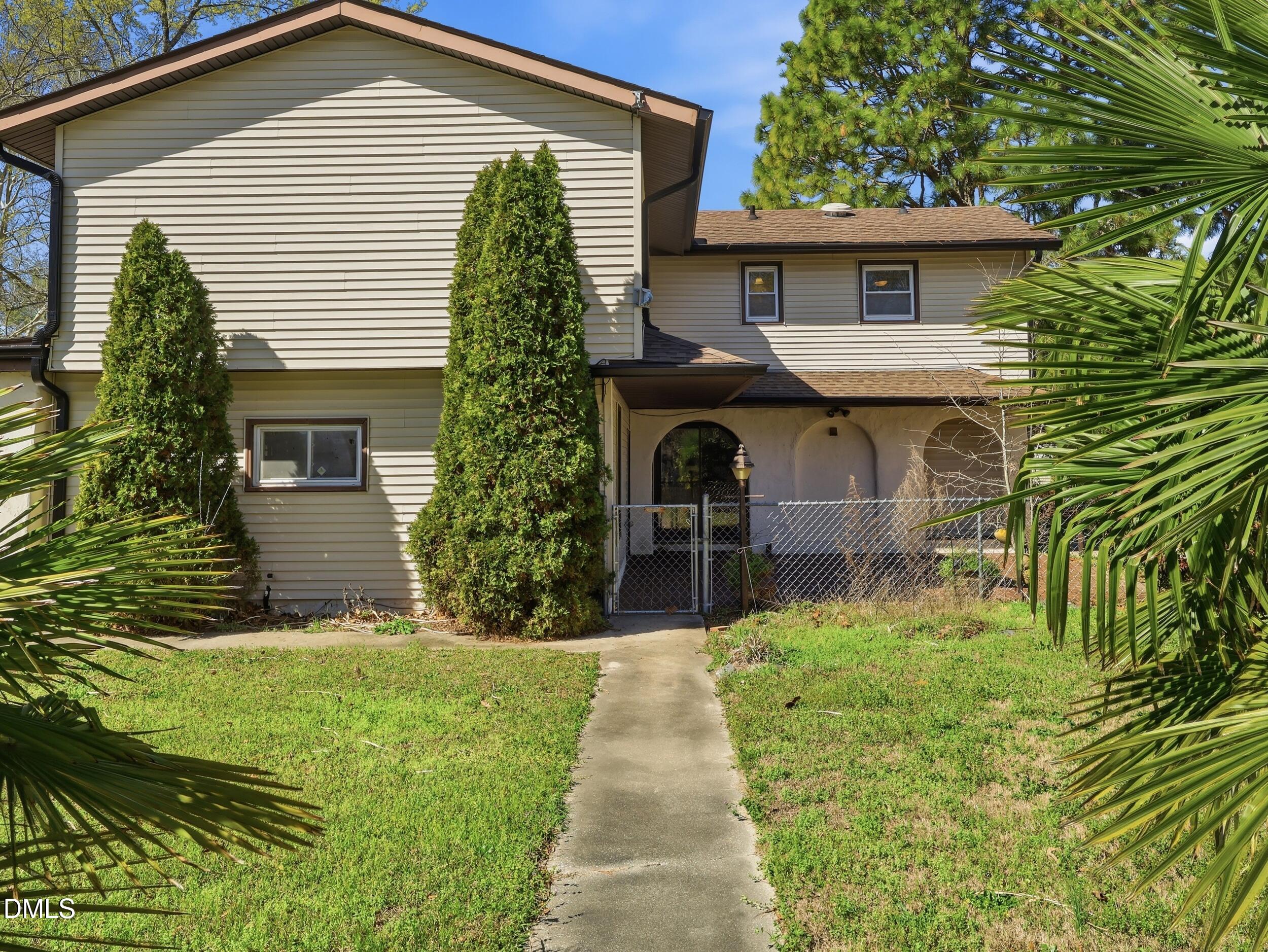 19405 Highway 210 Angier, NC 27501 - Photo 42 of 49 a front view of a house with garden