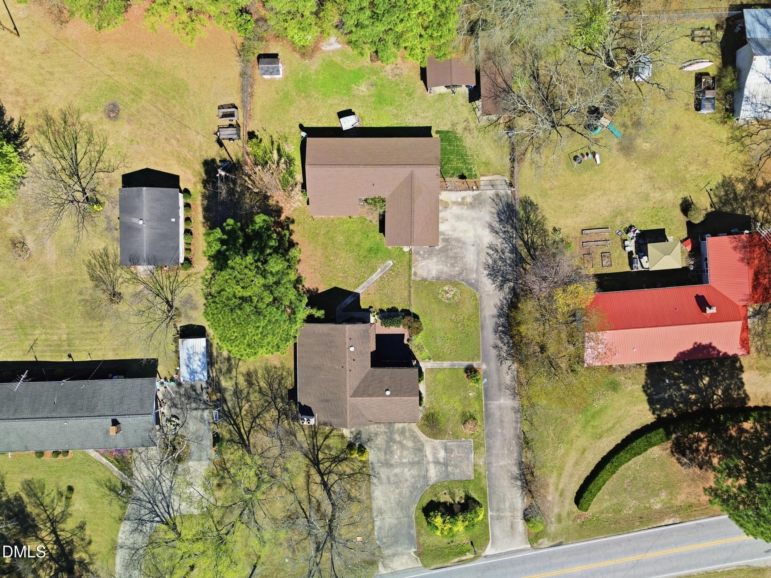 19405 Highway 210 Angier, NC 27501 - Photo 45 of 49 an aerial view of a house with outdoor space