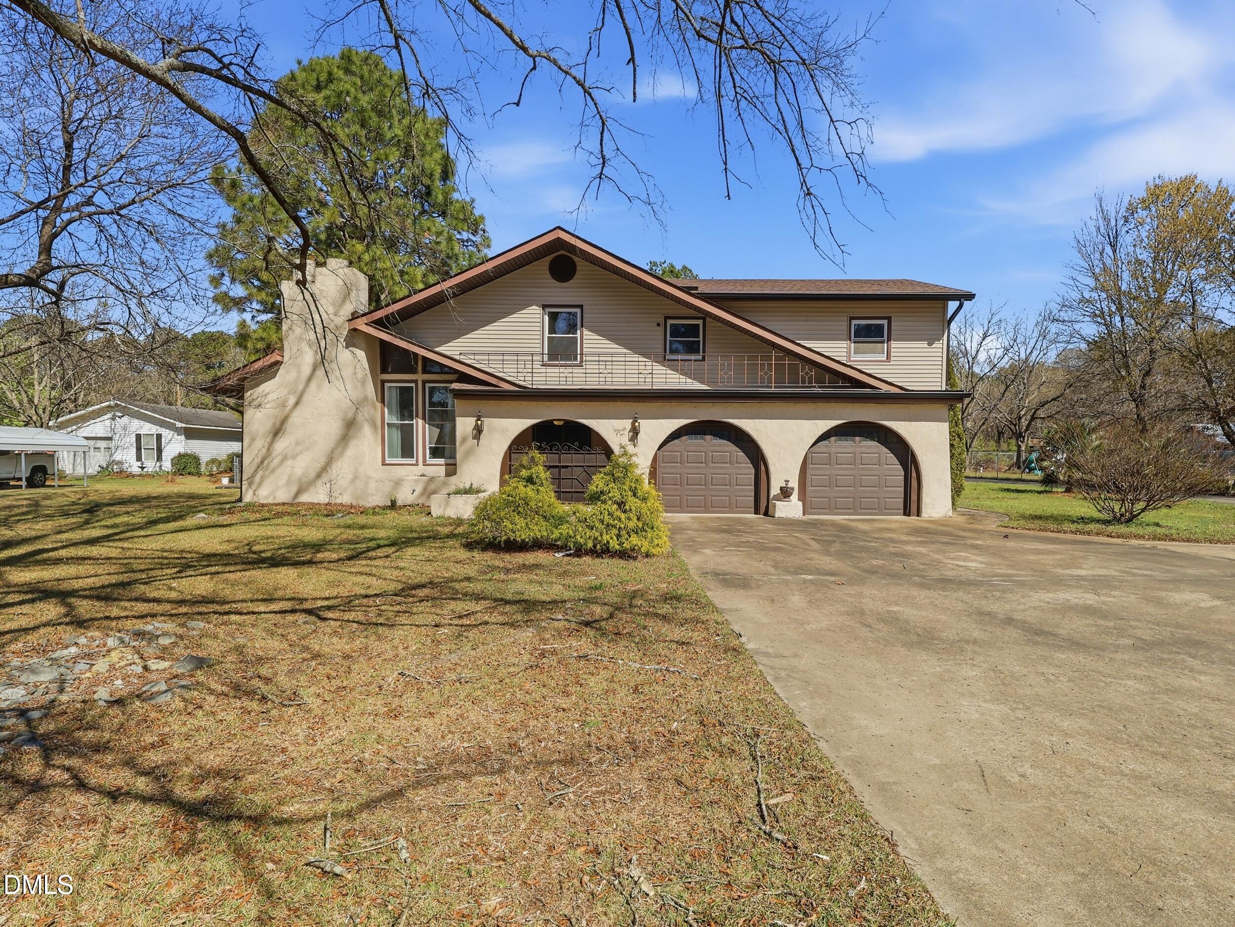 19405 Highway 210 Angier, NC 27501 - Photo 47 of 49 a front view of a house with garden