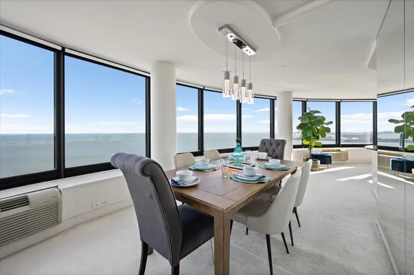 a view of a dining room with furniture