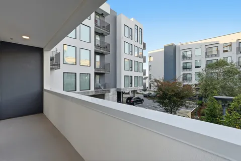 a view of a building from a balcony