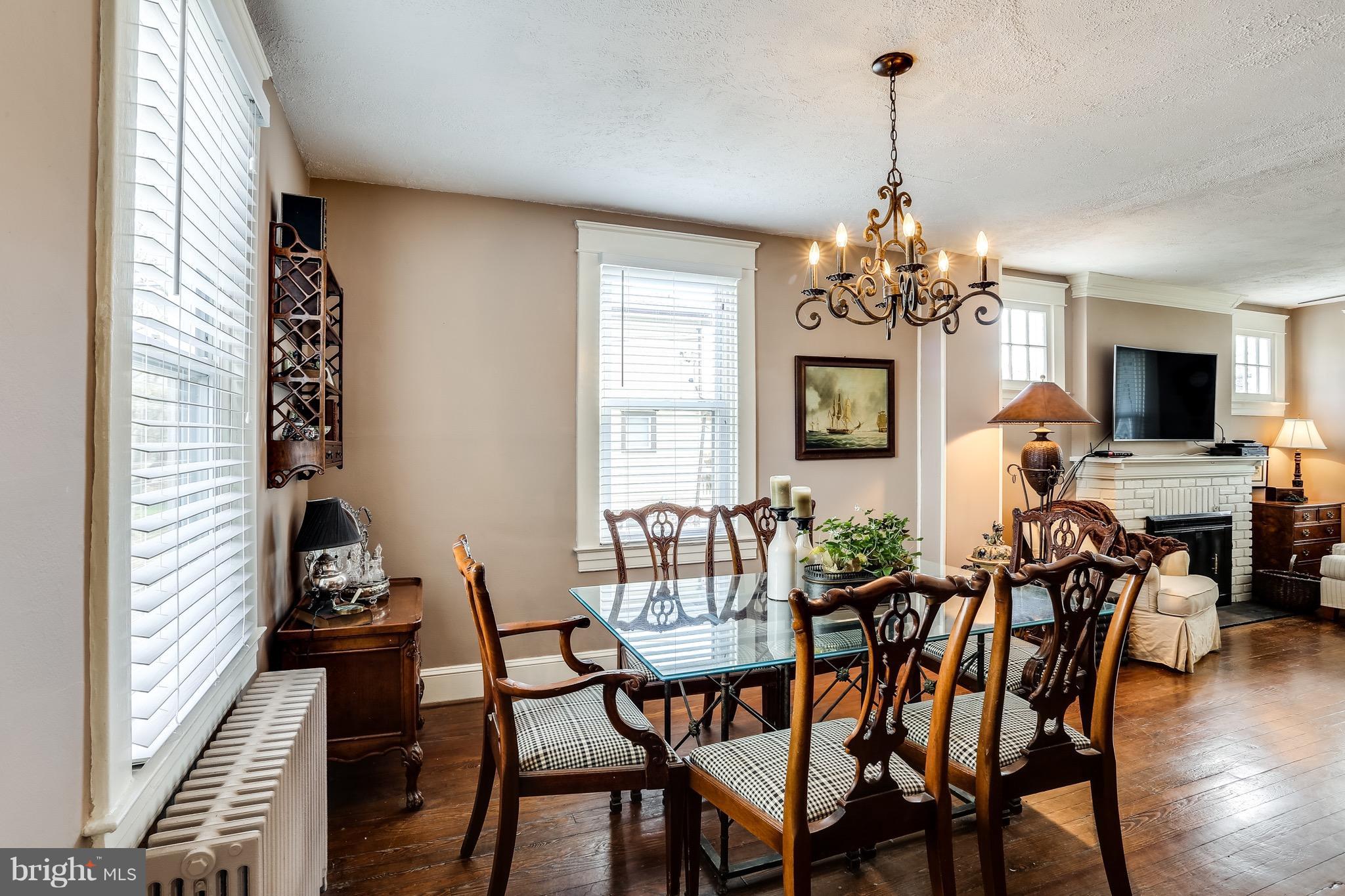 3522 St James Road Baltimore, MD 21244 - Photo 10 of 30 Dining Room w/ Hardwood Floors Open to Living Room