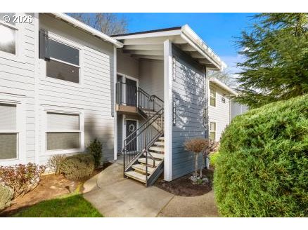 8496 Southwest Mohawk Street Tualatin, OR 97062 - Photo 1 of 39 a view of a house with a yard