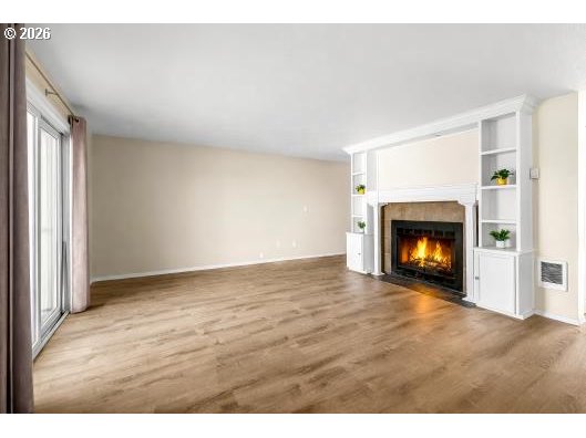 8496 Southwest Mohawk Street Tualatin, OR 97062 - Photo 11 of 39 a view of an empty room and fire place