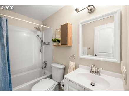 8496 Southwest Mohawk Street Tualatin, OR 97062 - Photo 25 of 39 a bathroom with a sink toilet and shower