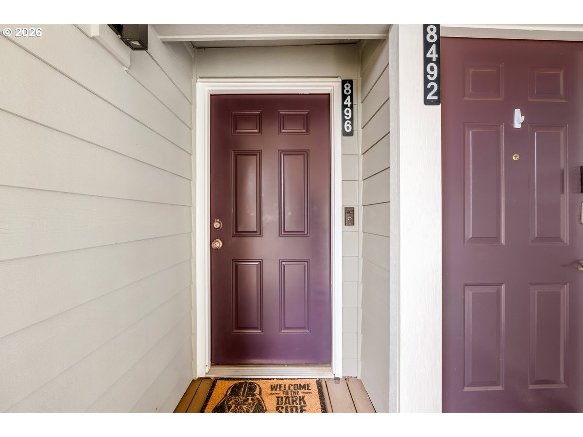 8496 Southwest Mohawk Street Tualatin, OR 97062 - Photo 4 of 39 a view of a wooden door