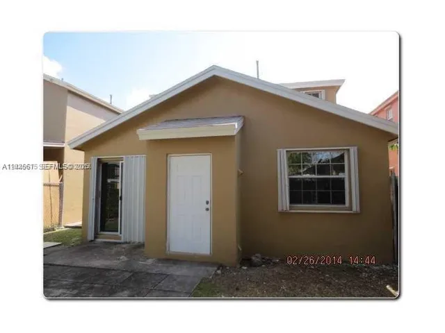a black and white photo of a house