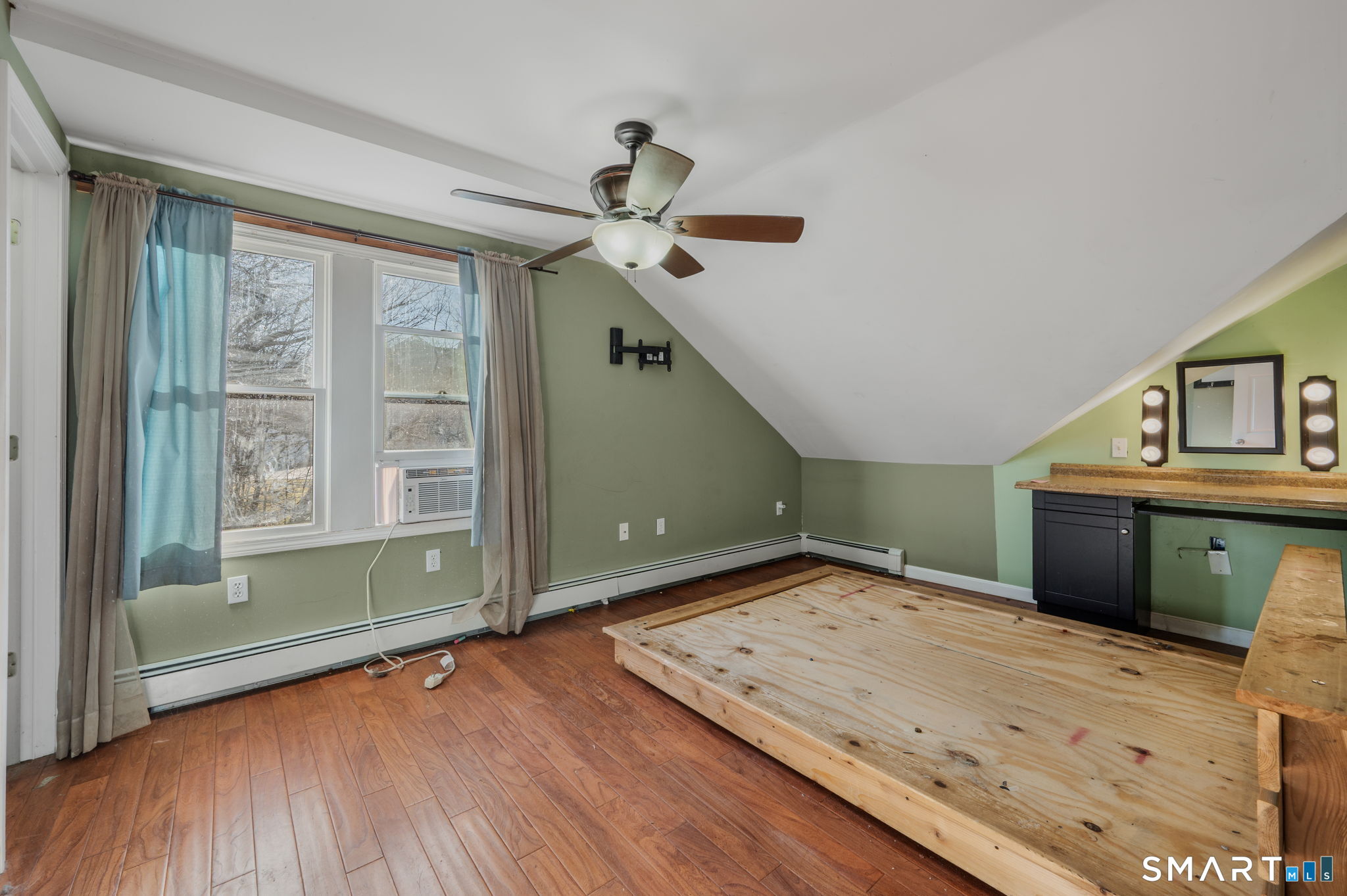 55 Bentley Avenue Norwich, CT 06360 - Photo 14 of 24 a view of a kitchen with a sink and a window