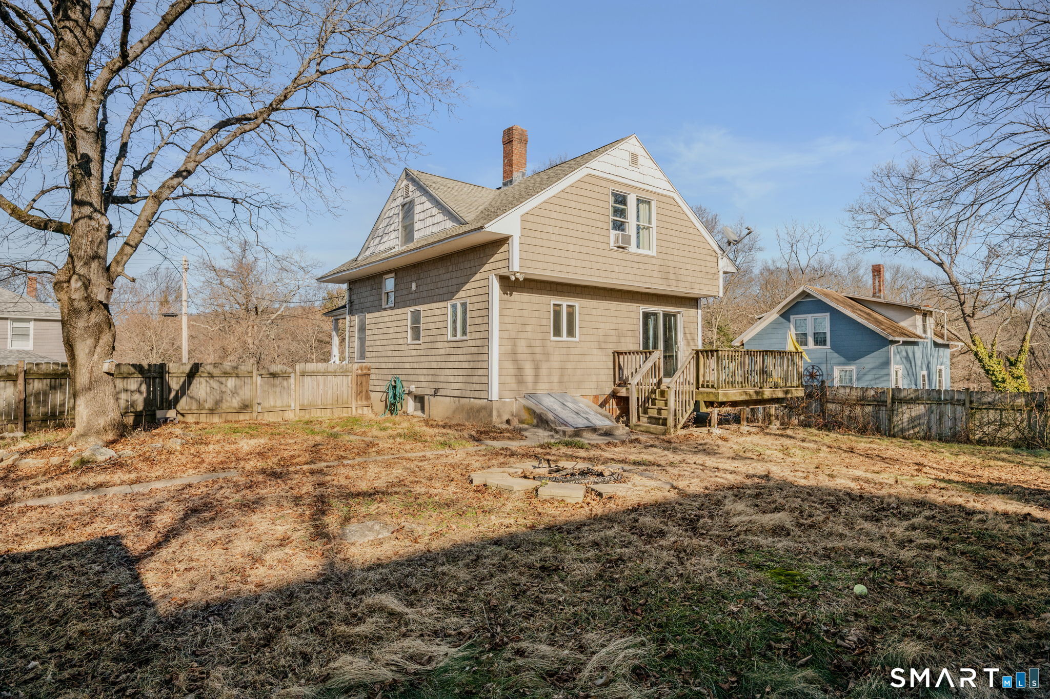 55 Bentley Avenue Norwich, CT 06360 - Photo 19 of 24 a front view of a house with a yard
