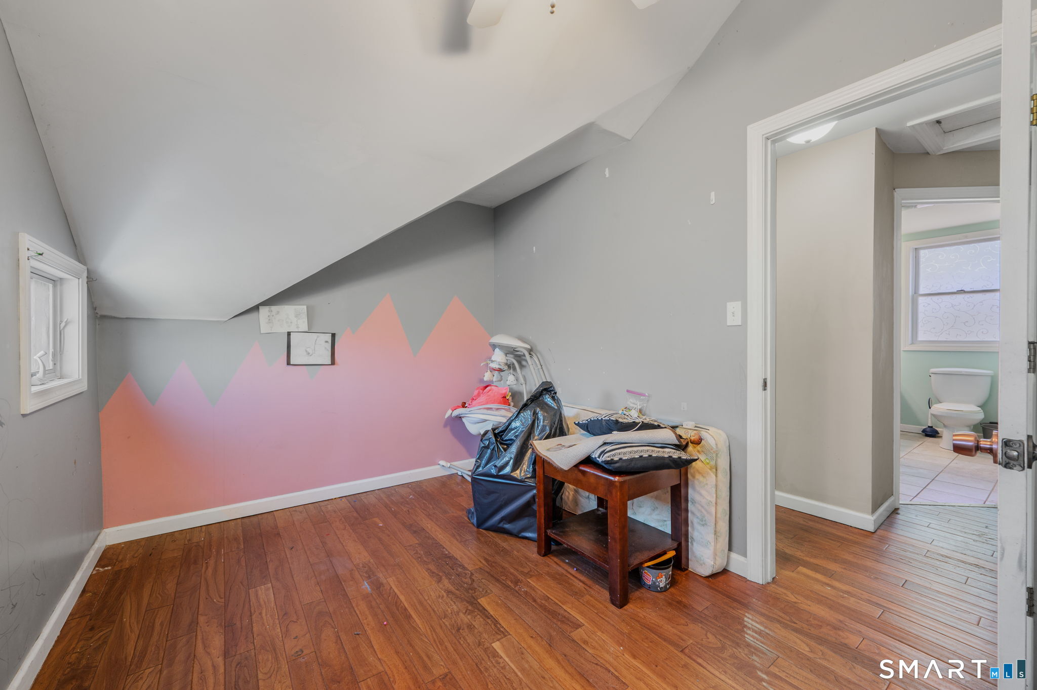 55 Bentley Avenue Norwich, CT 06360 - Photo 10 of 24 a view of a workspace with furniture and wooden floor