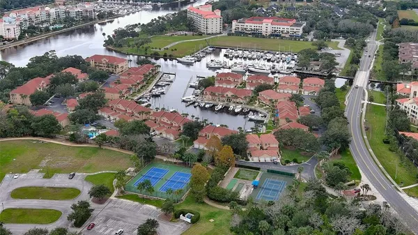 an aerial view of residential house with outdoor space and swimming pool