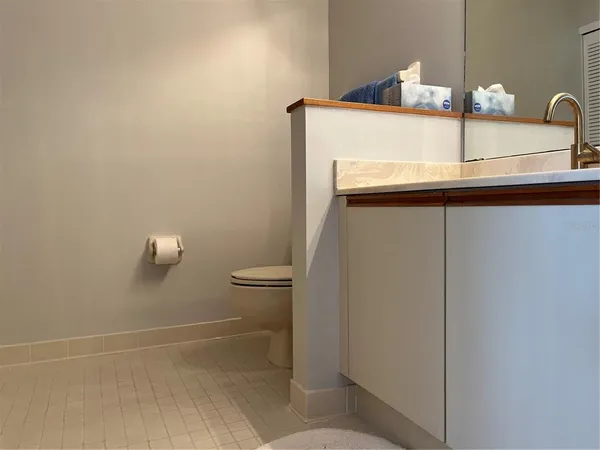 a bathroom with a sink and mirror