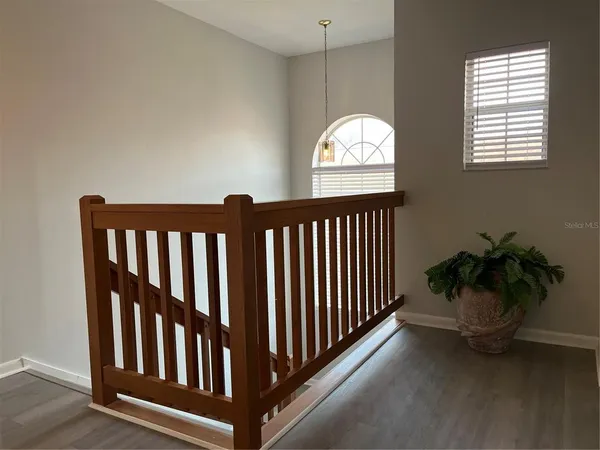 a view of entryway with wooden floor